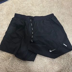 Nike running shorts, black, size medium, longer length in shorts (fit well)